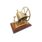 Drehbare Glocke aus Messing auf einem Holzsockel