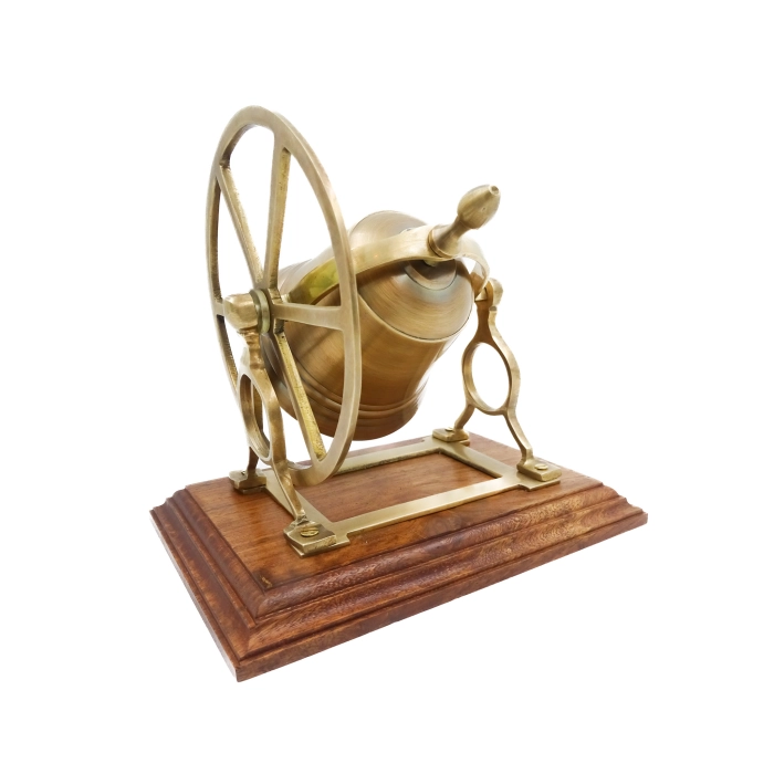 Drehbare Glocke aus Messing auf einem Holzsockel